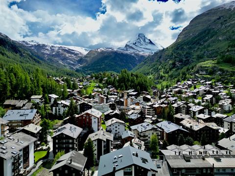 The village of Zermatt from above with the Matterhorn towering behind