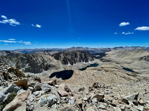 Alpine lake set in a granite basin high in the Sierra Nevada